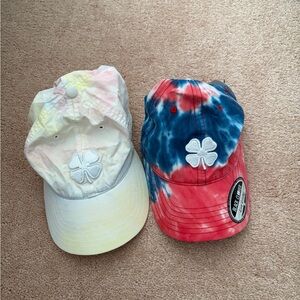 Tie-Dye Clover Caps hats. One brand new. One used.